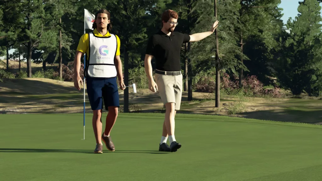 Player and Caddie walking off green after finishing hole